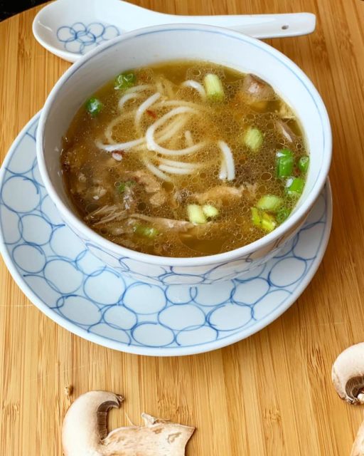 Asian-style duck soup with rice vermicelli and mushrooms