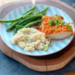 Crispy Parmesan chicken with Israeli couscous and green beans